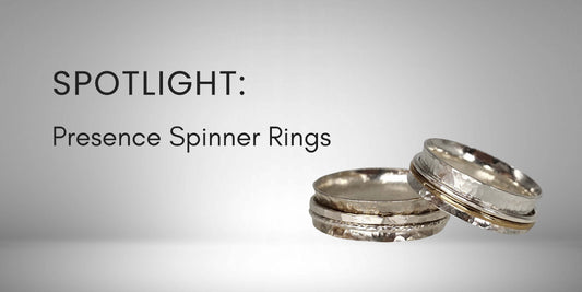 2 Silver Spinner Rings with 2 bands each and text that reads: "Spotlight: Presence Spinner Rings" on a grey background..