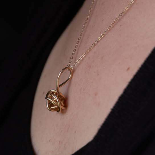 Gold Knot Necklace Pendant by Jaclyn Nicole