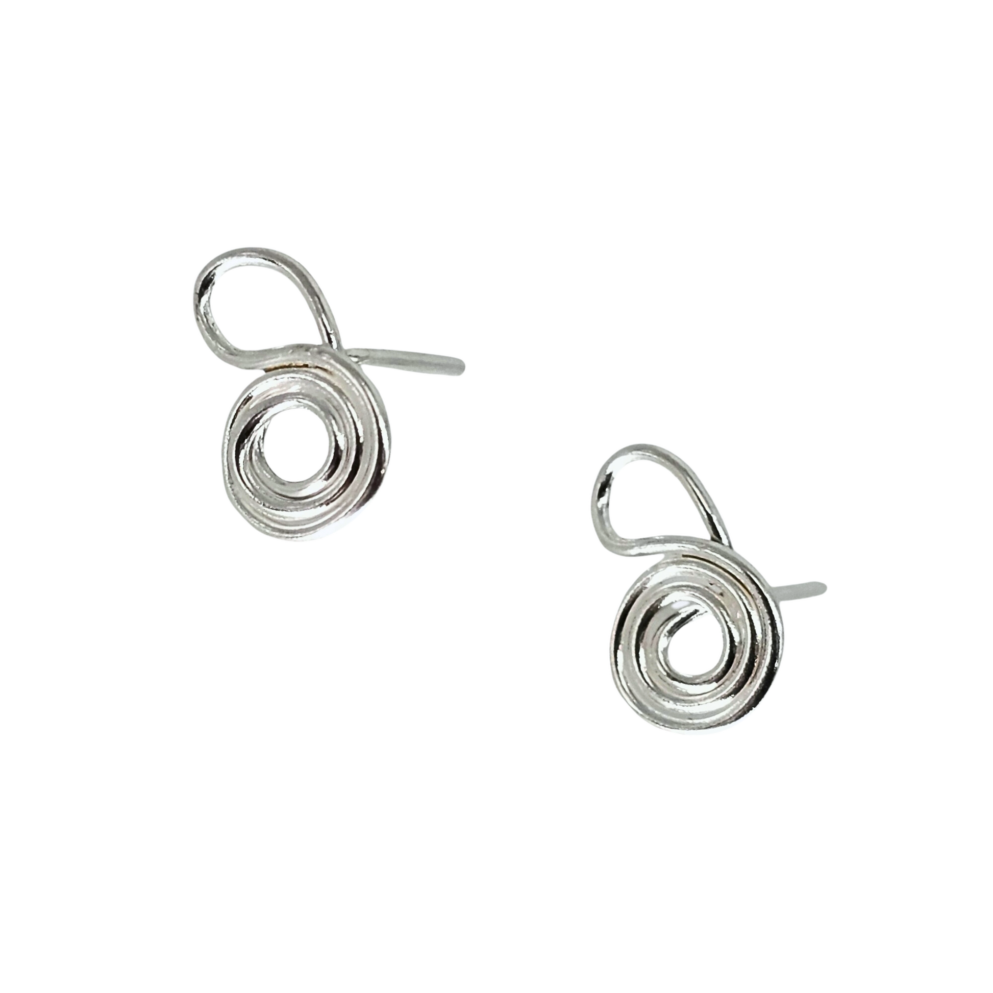 Silver stud earrings in the shape of a script g on white background