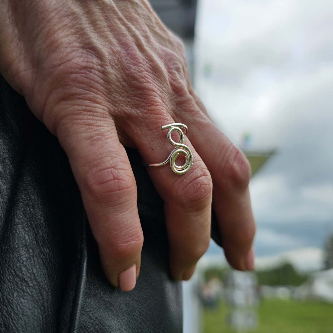 Jaclyn Nicole Silver Gratitude Ring on woman's hand