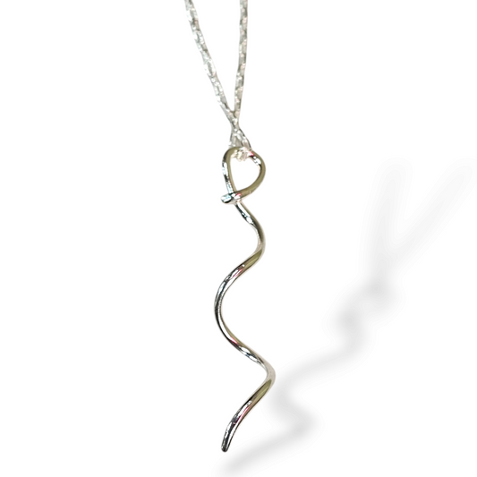 Silver Spiral Pendant on chain on white background.