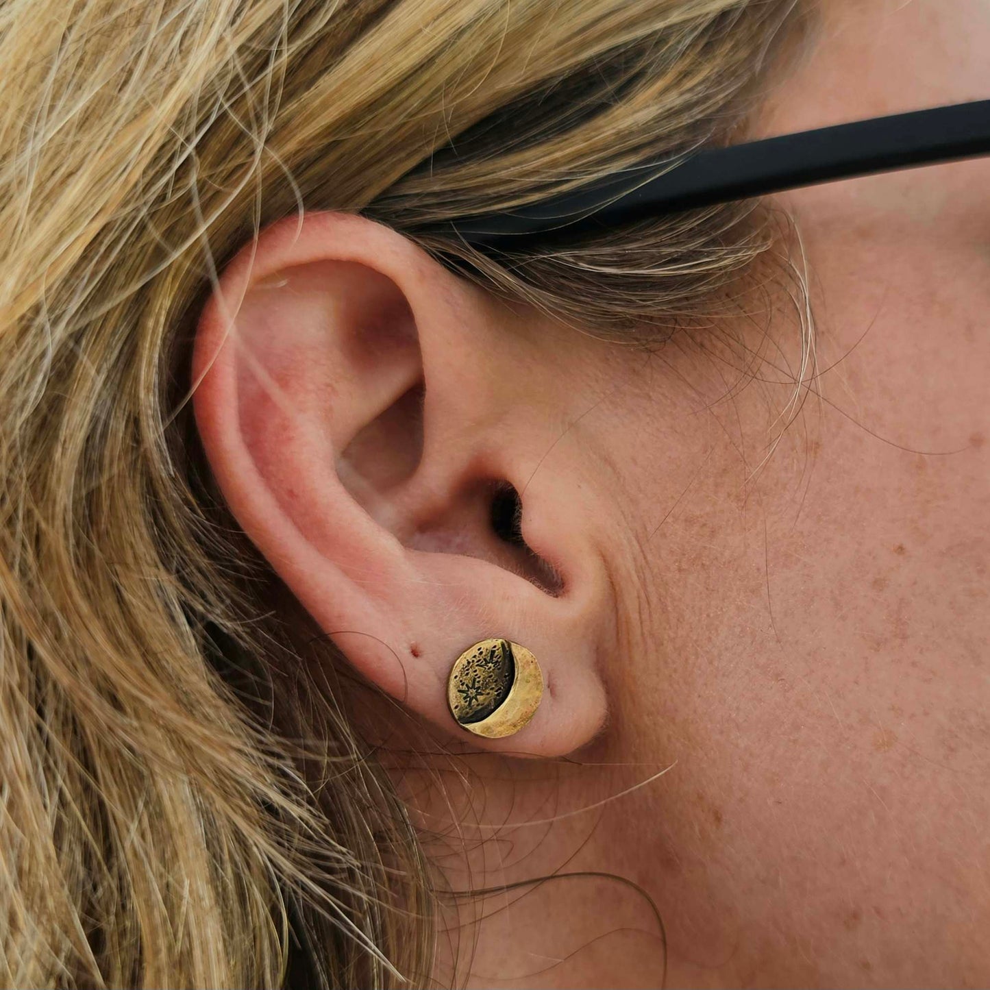 Jaclyn Nicole Gold stud moon and stars Earrings worn on woman's ear