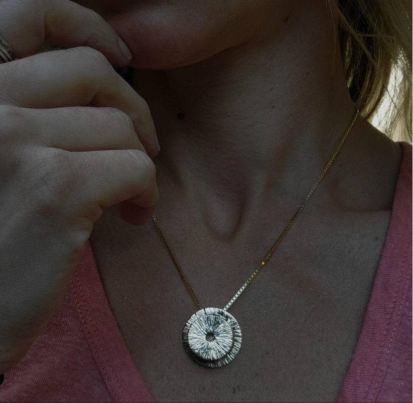 Woman wearing Jaclyn Nicole Manifestation Vessel 14K Gold with her hand on her chin Necklace 