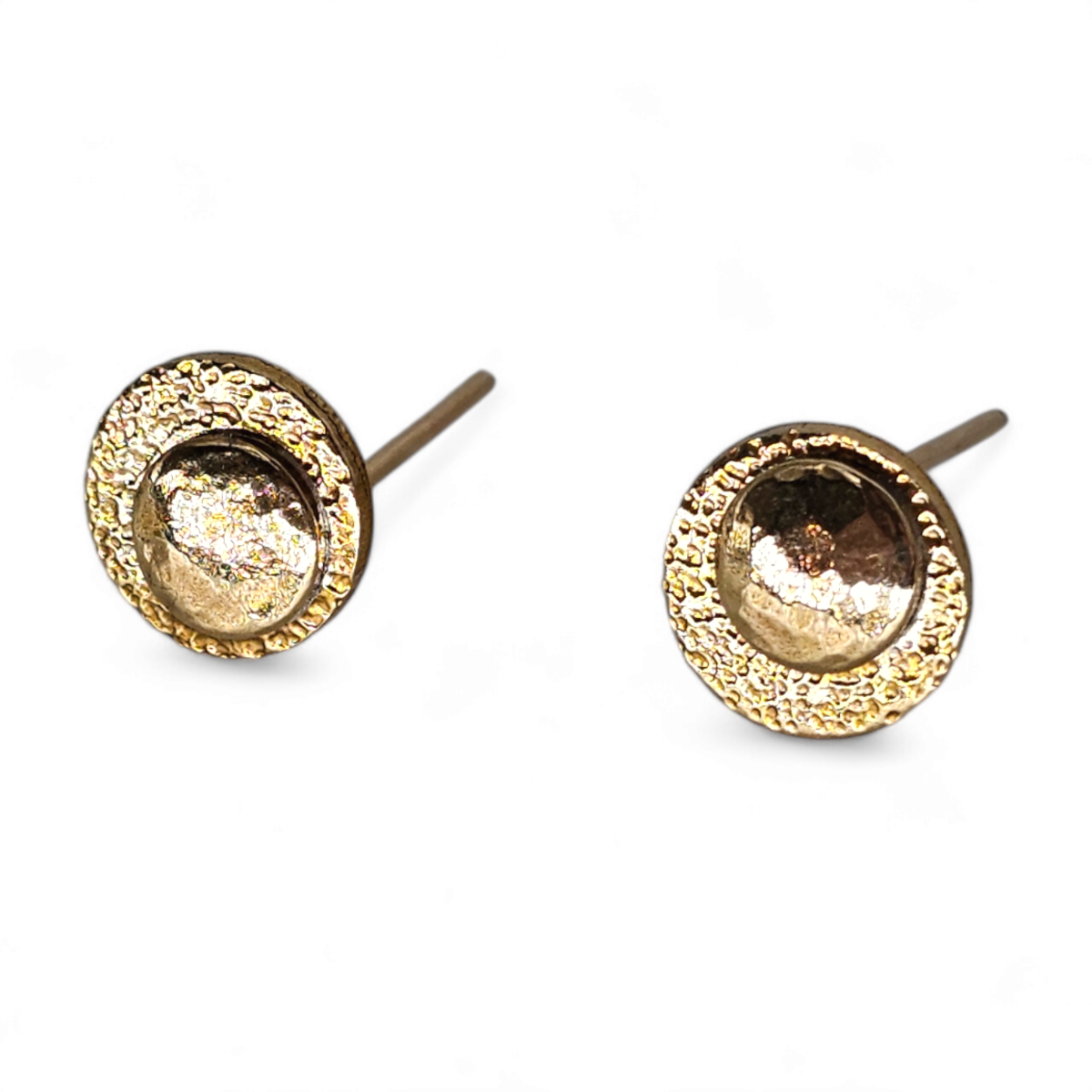 Gold stud earrings with a base disc textured with dots as stars and smaller domed textured disc's for moons.