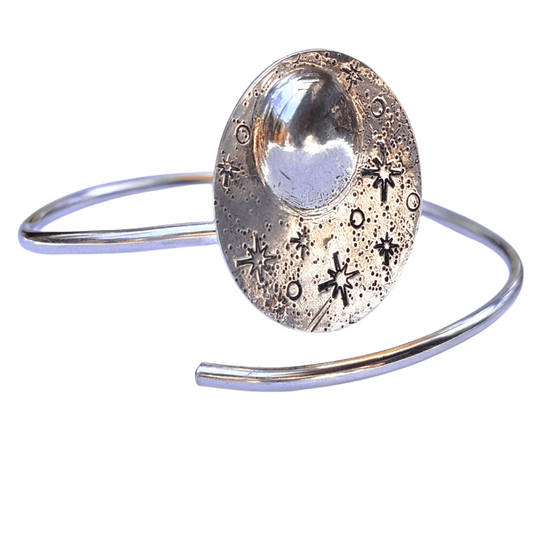 Close up of Reflections Moon cuff bracelet in sterling silver