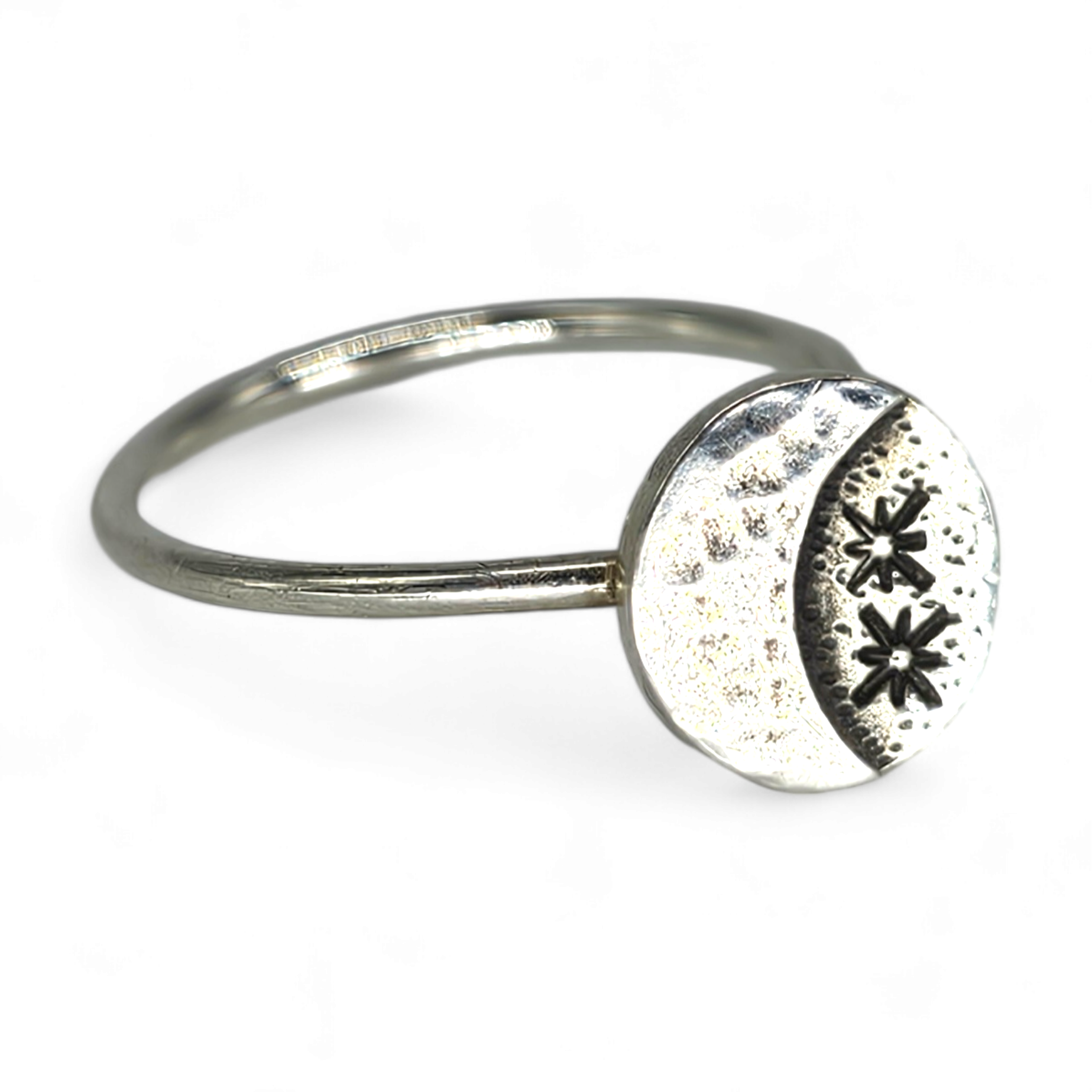 Close up of Sterling Silver adjustable ring with moon and stars