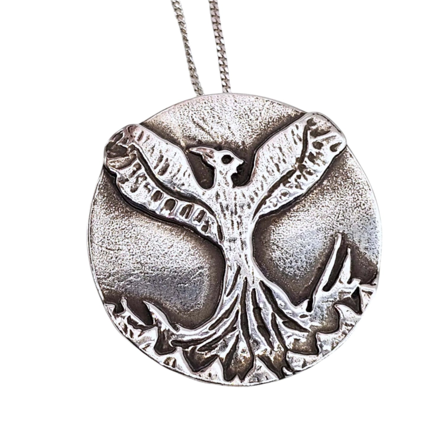 Sterling silver handcrafted Phoenix necklace on a white background