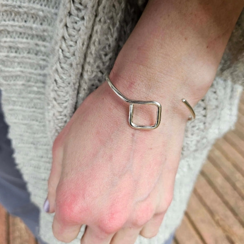 Silver Box Breathing Bracelet on Woman's Wrist