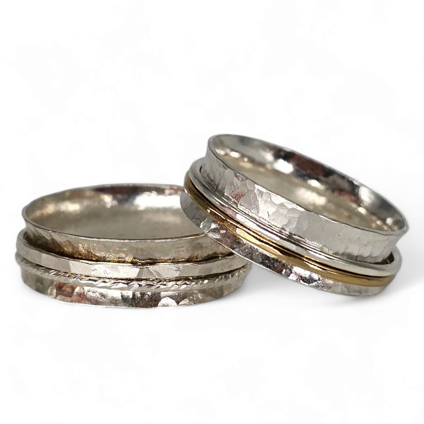 2 Silver spinner rings, 1 with a 1 silver and 1 gold thin rings that spin, and 1 with 2 silver rings that spin.